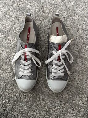 Prada Silver Leather Low-Top Sneakers with White Accents and Red Logo, 41